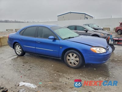 Czwarte zdjęcie samochodu z boku: 2003 FORD TAURUS SEL VIN:1FAHP56S03A156340 - miniatura