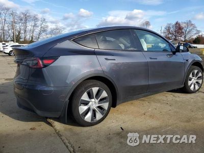 Trzecie zdjęcie samochodu z tyłu: 2023 TESLA MODEL Y VIN:7SAYGAEE4PF888498 - miniatura