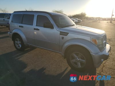 Czwarte zdjęcie samochodu z boku: 2011 DODGE NITRO SXT VIN:1D4PT5GKXBW547693 - miniatura