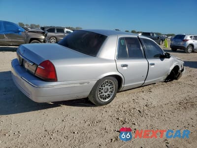 Trzecie zdjęcie samochodu z tyłu: 2001 MERCURY GRAND MARQUIS GS VIN:2MEFM74W61X611707 - miniatura