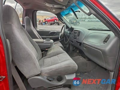Zdjęcie 10 z 12 samochodu: 2002 FORD F150 VIN:2FTRF18LX2CA48918 - miniatura