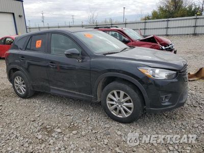 Czwarte zdjęcie samochodu z boku: 2016 MAZDA CX-5 VIN:JM3KE2CY9G0898817 - miniatura