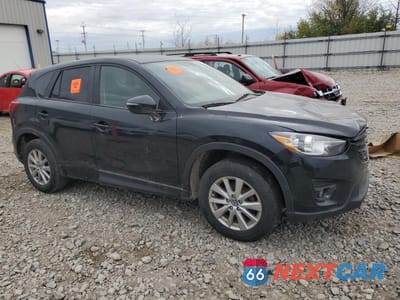Czwarte zdjęcie samochodu z boku: 2016 MAZDA CX-5 TOURING VIN:JM3KE2CY9G0898817 - miniatura