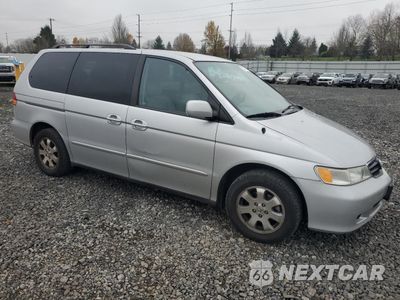 Czwarte zdjęcie samochodu z boku: 2002 HONDA ODYSSEY EXL VIN:2HKRL18042H567083 - miniatura