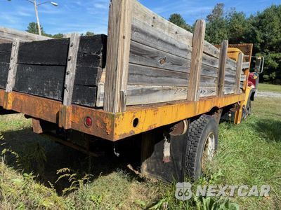 Czwarte zdjęcie samochodu z boku: 1987 INTERNATIONAL 1954 FLATBED TRUCK VIN:1HTLDTVNXHH472598 - miniatura