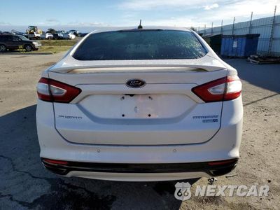 Zdjęcie 6 z 13 samochodu: 2014 FORD FUSION TITANIUM VIN:3FA6P0D9XER232990 - miniatura