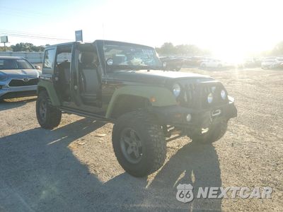 Czwarte zdjęcie samochodu z boku: 2010 JEEP WRANGLER UNLIMITED RUBICON VIN:1J4BA6H11AL228573 - miniatura
