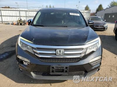 Piąte zdjęcie samochodu w środku: 2016 HONDA PILOT EXL VIN:5FNYF6H62GB090454 - miniatura