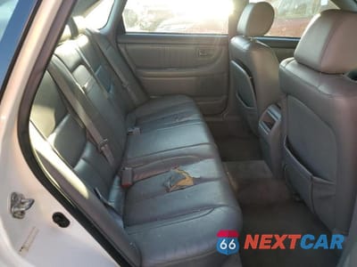 Zdjęcie 10 z 13 samochodu: 2003 TOYOTA AVALON XL VIN:4T1BF28B43U325607 - miniatura