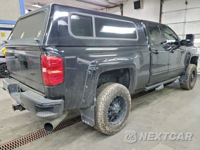 Trzecie zdjęcie samochodu z tyłu: 2015 CHEVROLET SILVERADO K2500 HEAVY DUTY LT VIN:1GC2KVE88FZ506601 - miniatura