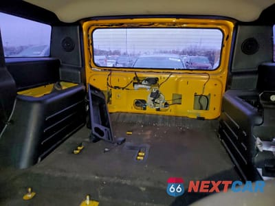 Zdjęcie 10 z 14 samochodu: 2005 HUMMER H2 VIN:5GRGN23U75H132545 - miniatura