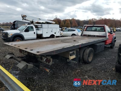 Trzecie zdjęcie samochodu z tyłu: 2019 FORD F550 SUPER DUTY ROLLBACK TRUCK VIN:1FDUF5HY8KDA07938 - miniatura