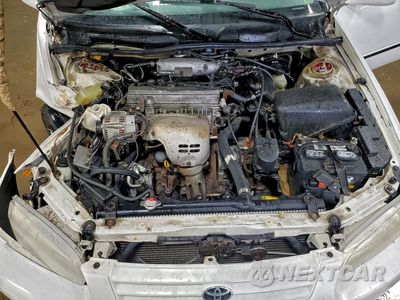 Zdjęcie 11 z 11 samochodu: 1999 TOYOTA CAMRY LE VIN:JT2BG22K5X0374668 - miniatura