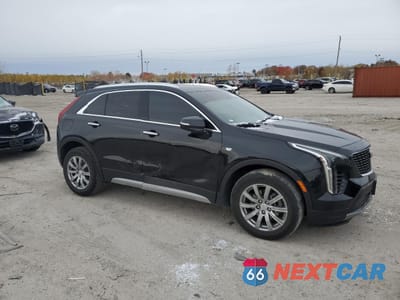 Czwarte zdjęcie samochodu z boku: 2023 CADILLAC XT4 PREMIUM LUXURY VIN:1GYFZCR49PF126494 - miniatura