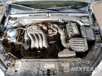 Zdjęcie 11 z 12 samochodu: 2015 VOLKSWAGEN JETTA BASE VIN:3VW1K7AJ2FM427584 - miniatura