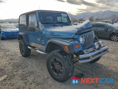 Czwarte zdjęcie samochodu z boku: 1997 JEEP WRANGLER / TJ SPORT VIN:1J4FY19S8VP447407 - miniatura