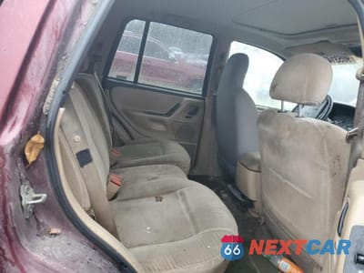 Zdjęcie 11 z 13 samochodu: 1999 JEEP GRAND CHEROKEE LAREDO VIN:1J4GW58SXXC566847 - miniatura
