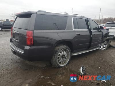 Trzecie zdjęcie samochodu z tyłu: 2015 CHEVROLET SUBURBAN K1500 LTZ VIN:1GNSKKKC2FR132744 - miniatura