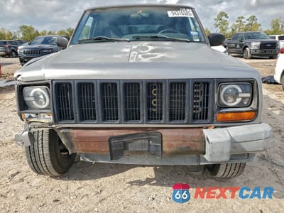 Piąte zdjęcie samochodu w środku: 2001 JEEP CHEROKEE SPORT VIN:1J4FT48SX1L570208 - miniatura