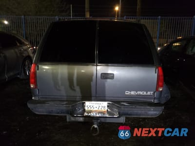 Zdjęcie 6 z 12 samochodu: 1999 CHEVROLET TAHOE K150 VIN:1GNEK13RXXJ352238 - miniatura