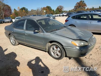 Czwarte zdjęcie samochodu z boku: 2005 FORD TAURUS VIN:1FAFP532X5A143447 - miniatura