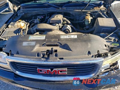 Zdjęcie 11 z 14 samochodu: 2000 GMC NEW SIERRA K1500 VIN:1GTEK14T2YZ168952 - miniatura