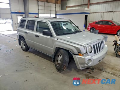 Czwarte zdjęcie samochodu z boku: 2009 JEEP PATRIOT SPORT VIN:1J4FT28A89D154692 - miniatura