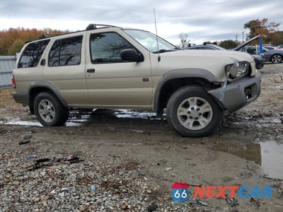 Czwarte zdjęcie samochodu z boku: 1999 NISSAN PATHFINDER LE VIN:JN8AR07Y4XW350443 - miniatura