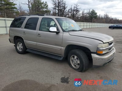 Czwarte zdjęcie samochodu z boku: 2001 CHEVROLET TAHOE K1500 VIN:1GNEK13T31J256843 - miniatura