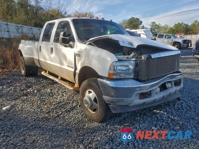 Czwarte zdjęcie samochodu z boku: 2002 FORD F350 SUPER DUTY VIN:1FTWW33FX2ED06946 - miniatura