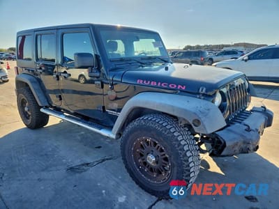 Czwarte zdjęcie samochodu z boku: 2011 JEEP WRANGLER UNLIMITED RUBICON VIN:1J4BA6H13BL580118 - miniatura