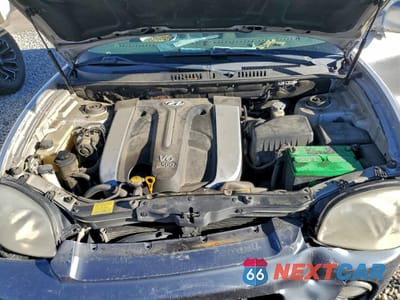 Zdjęcie 12 z 14 samochodu: 2003 HYUNDAI SANTA FE GLS VIN:KM8SC73E23U464917 - miniatura