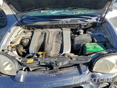 Zdjęcie 12 z 14 samochodu: 2003 HYUNDAI SANTA FE GLS VIN:KM8SC73E23U464917 - miniatura