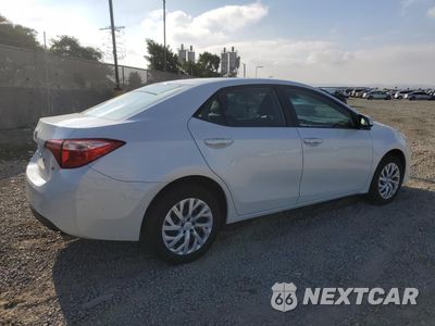 Trzecie zdjęcie samochodu z tyłu: 2018 TOYOTA COROLLA L VIN:5YFBURHE9JP766687 - miniatura