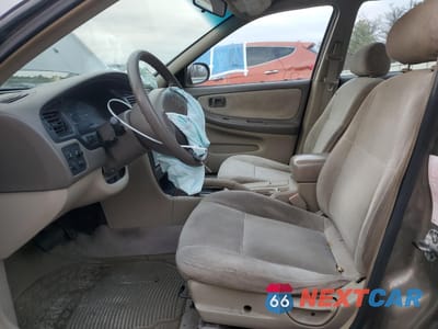 Zdjęcie 7 z 12 samochodu: 1999 NISSAN ALTIMA XE VIN:1N4DL01D0XC143734 - miniatura