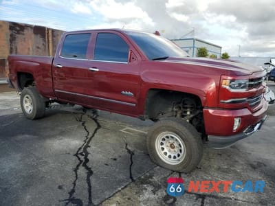 Czwarte zdjęcie samochodu z boku: 2017 CHEVROLET SILVERADO K1500 HIGH COUNTRY VIN:3GCUKTEJ0HG422856 - miniatura