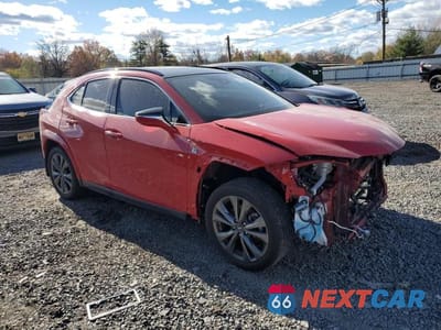 Czwarte zdjęcie samochodu z boku: 2023 LEXUS UX 250H BASE VIN:JTHB9JBH5P2067701 - miniatura