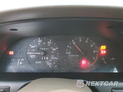 Zdjęcie 9 z 12 samochodu: 1999 NISSAN ALTIMA XE VIN:1N4DL01D0XC143734 - miniatura