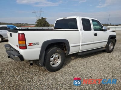 Trzecie zdjęcie samochodu z tyłu: 2001 GMC NEW SIERRA K1500 VIN:1GTEK19T11E190222 - miniatura