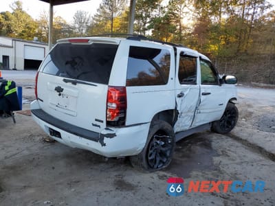 Trzecie zdjęcie samochodu z tyłu: 2012 CHEVROLET TAHOE K1500 LT VIN:1GNSKBE02CR179673 - miniatura