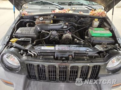 Zdjęcie 12 z 13 samochodu: 2004 JEEP LIBERTY SPORT VIN:1J4GL48K34W260926 - miniatura