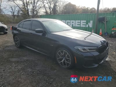 Czwarte zdjęcie samochodu z boku: 2022 BMW 530XE VIN:WBA33AG07NCK31223 - miniatura