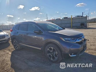 Czwarte zdjęcie samochodu z boku: 2019 HONDA CR-V TOURING VIN:7FARW2H95KE007023 - miniatura