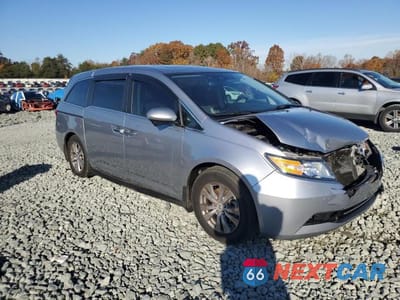 Czwarte zdjęcie samochodu z boku: 2016 HONDA ODYSSEY EXL VIN:5FNRL5H68GB095262 - miniatura