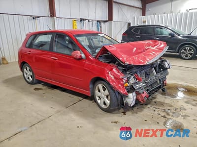 Czwarte zdjęcie samochodu z boku: 2009 KIA SPECTRA SX VIN:KNAFE242X95023558 - miniatura