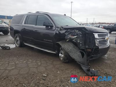 Czwarte zdjęcie samochodu z boku: 2015 CHEVROLET SUBURBAN K1500 LTZ VIN:1GNSKKKC2FR132744 - miniatura