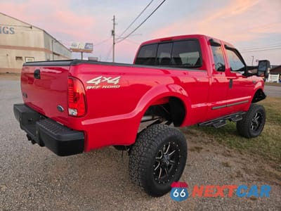 Czwarte zdjęcie samochodu z boku: 2000 FORD F250 SUPER DUTY VIN:1FTNX21S1YED09617 - miniatura