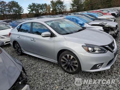 Czwarte zdjęcie samochodu z boku: 2017 NISSAN SENTRA S VIN:3N1AB7AP6HY256960 - miniatura