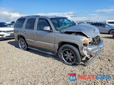 Czwarte zdjęcie samochodu z boku: 2003 GMC YUKON VIN:1GKEC13Z23J284733 - miniatura