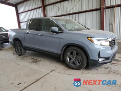 Czwarte zdjęcie samochodu z boku: 2022 HONDA RIDGELINE RTL VIN:5FPYK3F73NB503279 - miniatura